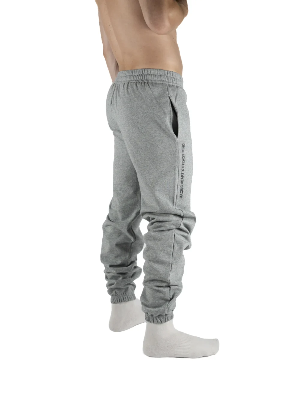 Back view of a model wearing the gray RHSM Classic Fit Sweatpants.