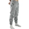 Front view of a model wearing the gray RHSM Classic Fit Sweatpants, showing the comfortable athletic fit.