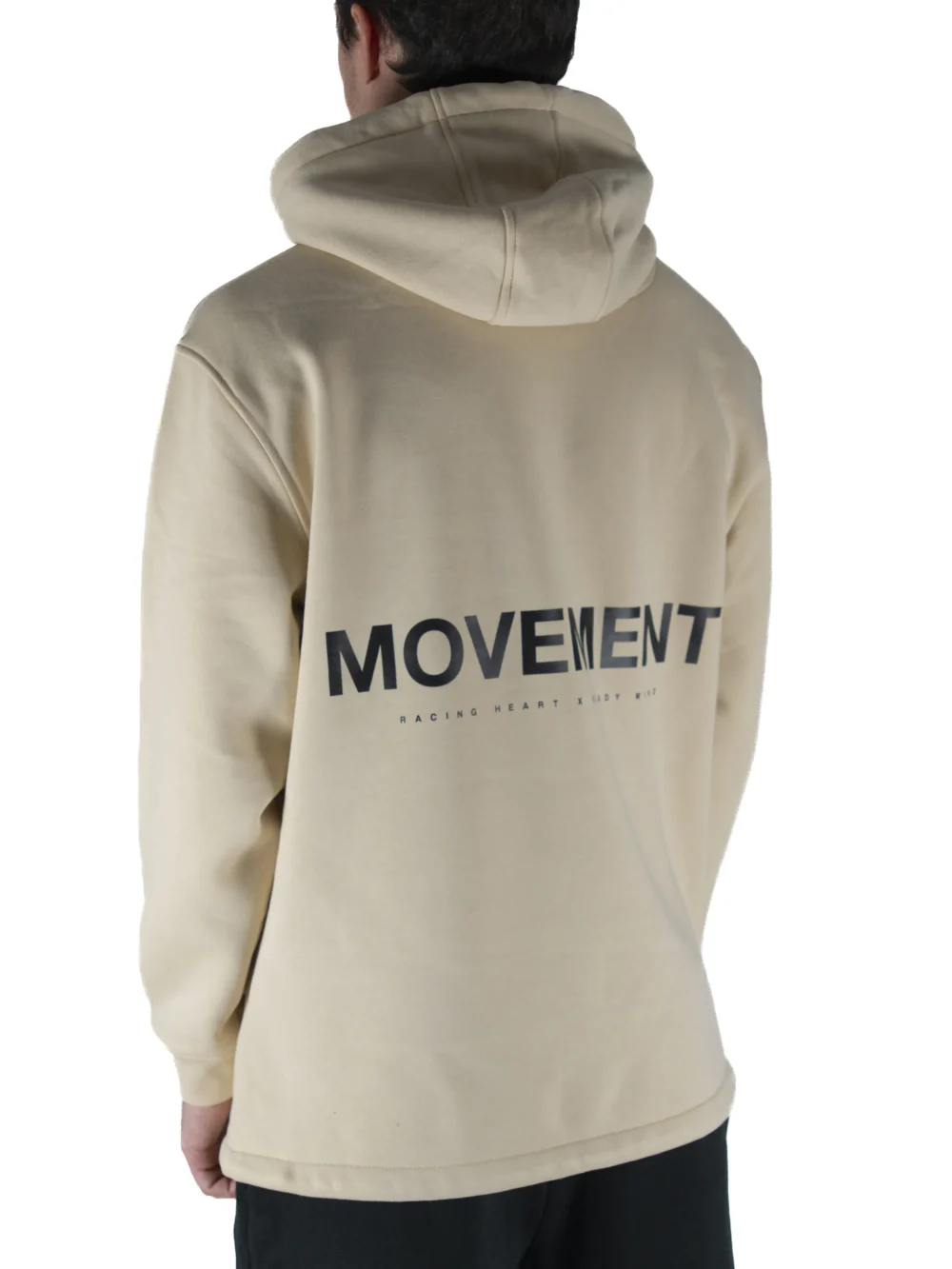 Back view of a model wearing the beige RHSM MVMT Hoodie, showing the designer-inspired "MOVEMENT" back graphic.