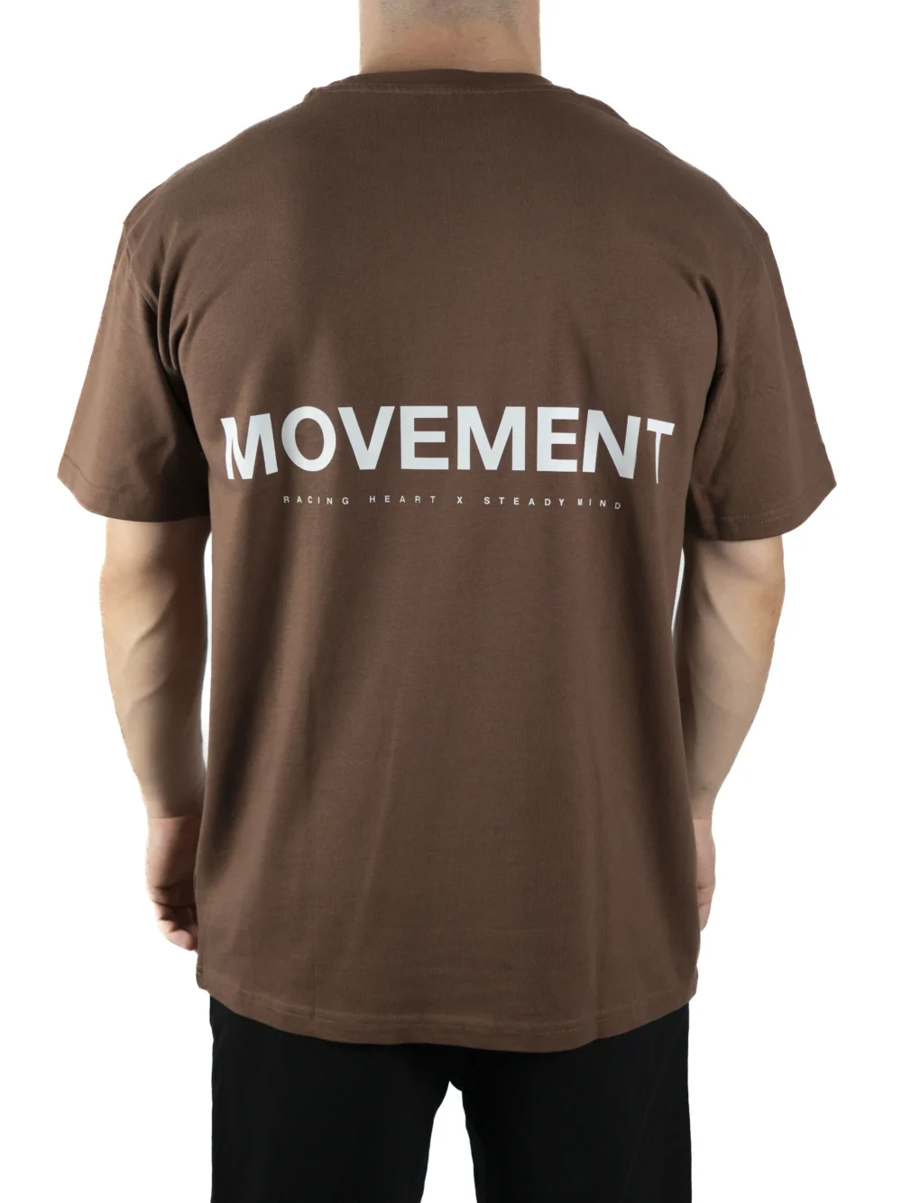 Back view of a model wearing the brown RHSM Movement Tee, highlighting the designer-inspired back graphic.