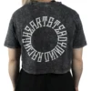 Back view of a model wearing the RHSM Acid Wash Crop-Top, showing the "Racing Heart Steady Mind" graphic.