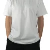 Front view of a model wearing the white RHSM Movement Tee, showing its oversized fit and dropped shoulders.