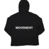 The back of the black RHSM MVMT Hoodie laid flat to display the full "MOVEMENT" screen-printed graphic.