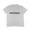 The back of the white RHSM Movement oversized tee laid flat, showcasing the minimalist back print graphic.