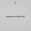 A close-up of the subtle front graphic on the white RHSM Classic Fit Tee.