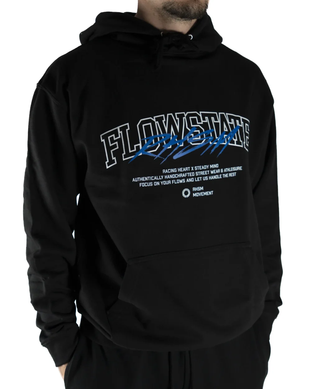 Model wearing the black RHSM Flowstate Hoodie, designed for calisthenics and street workout.
