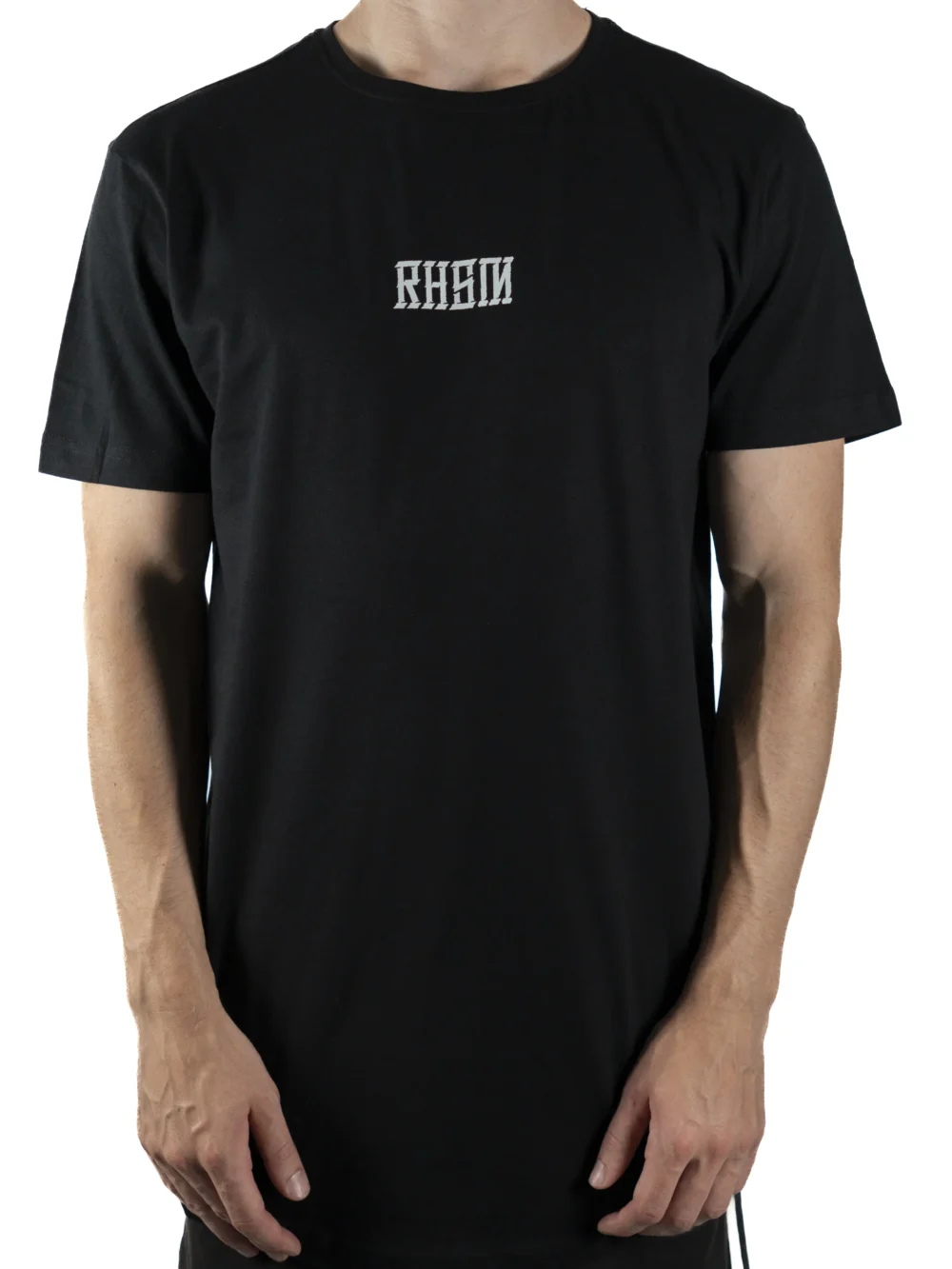 Front view of a model wearing the black RHSM Long Fit Tee V2, highlighting its relaxed long fit.