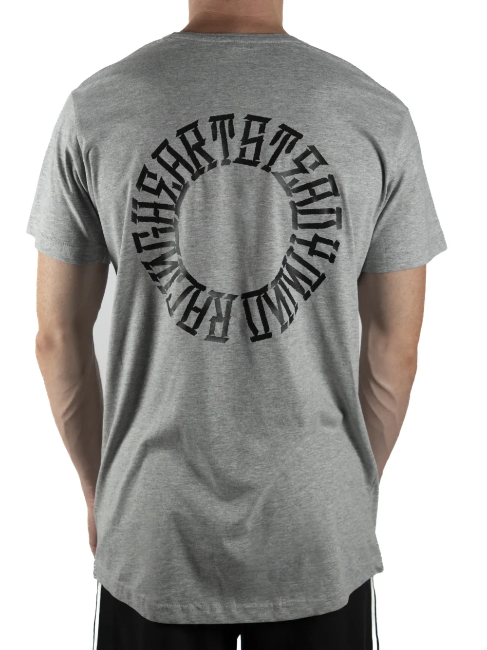 Back view of a model wearing the gray RHSM Long Fit Tee V2, showing the "Racing Heart Steady Mind" graphic.