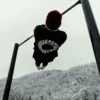 An athlete performing an advanced calisthenics front lever while wearing the RHSM Long Fit Tee V2.
