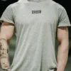 Model wearing the gray RHSM Long Fit Tee V2 outside, showcasing its modern streetwear style.