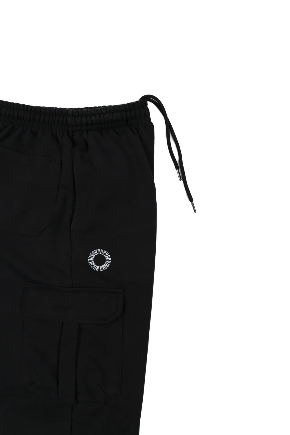 A close-up view of the spacious side cargo pocket on the black RHSM Sweatpants, perfect for training essentials.