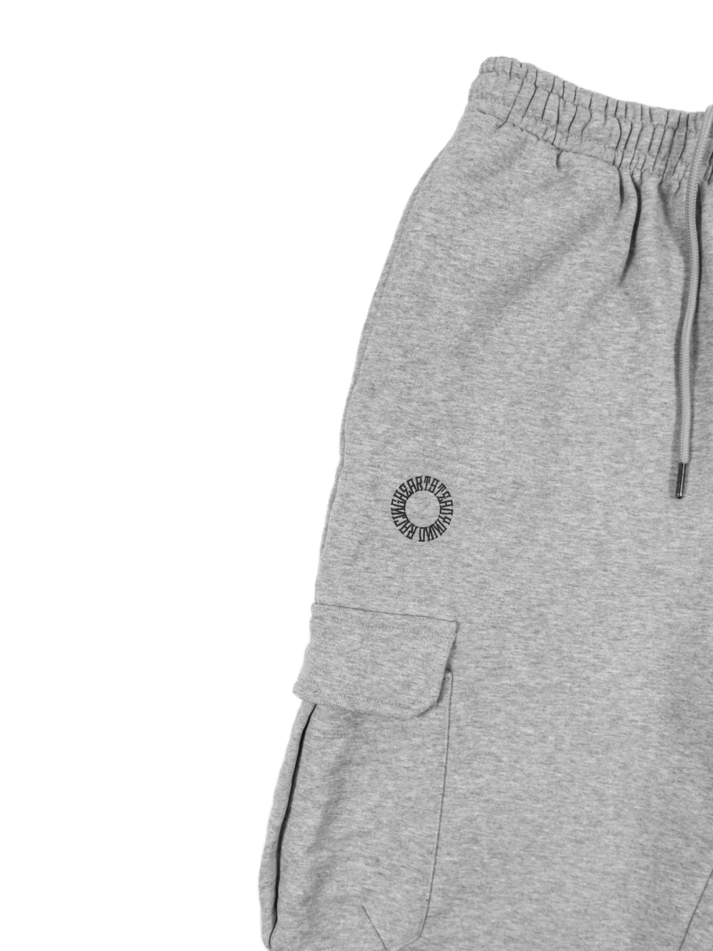 A close-up of the front side pocket design and premium fabric of the gray RHSM Cargo Sweatpants.