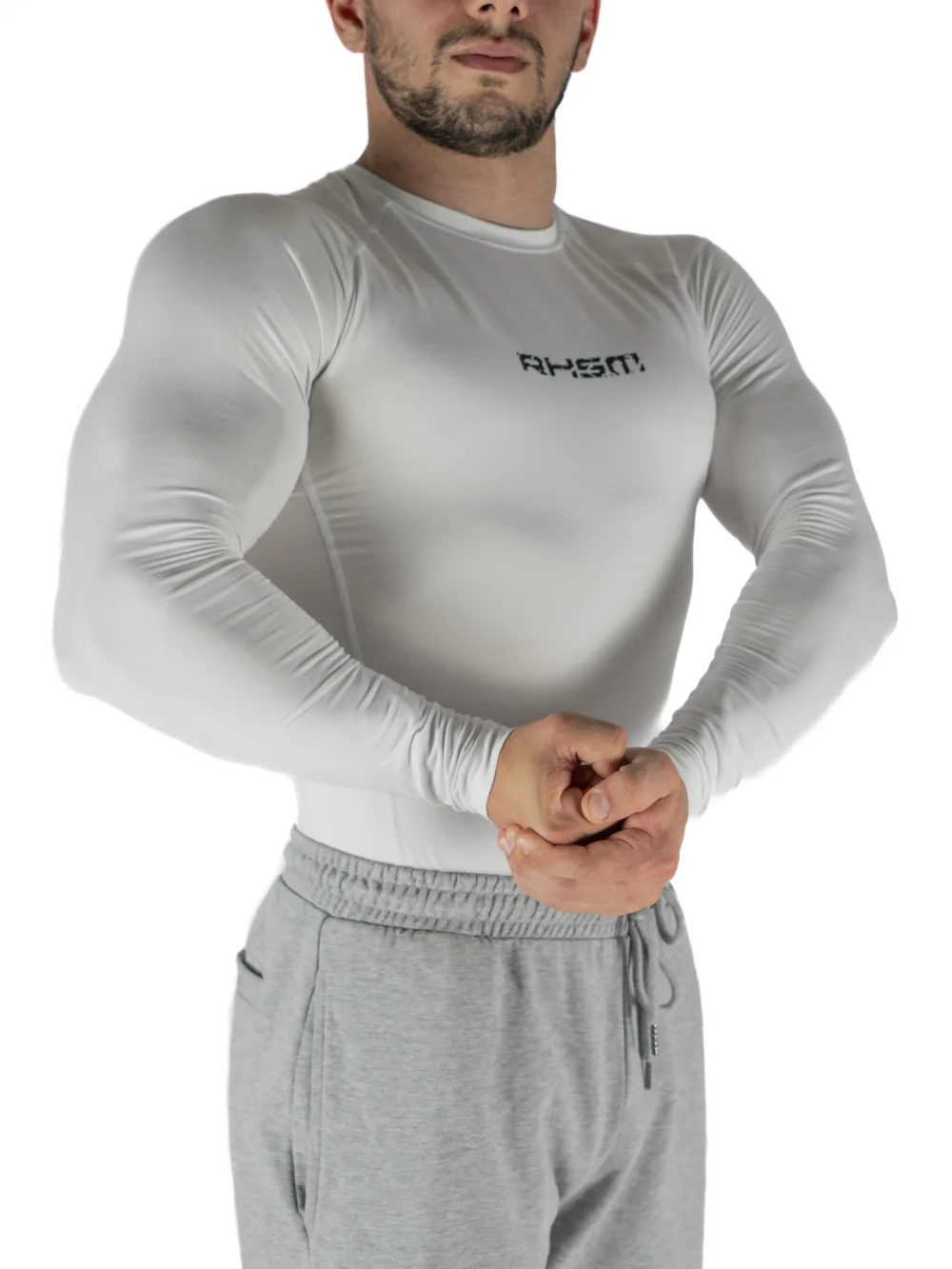 Front view of a model wearing the white RHSM Compression Shirt, showing its supportive fit.
