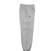 A side view of the gray RHSM Cargo Sweatpants laid flat, showcasing the spacious side cargo pocket.