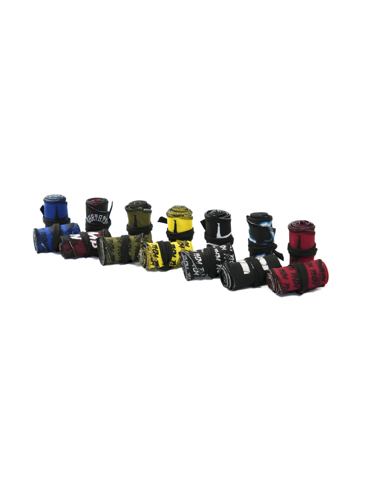 All colorways of the RHSM Calisthenics Wrist Wraps V2 rolled up together, including black, blue, red, yellow, and khaki.