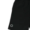 Closeup of the screen-printed RHSM First Edition emblem on the pocket of the black cotton shorts.
