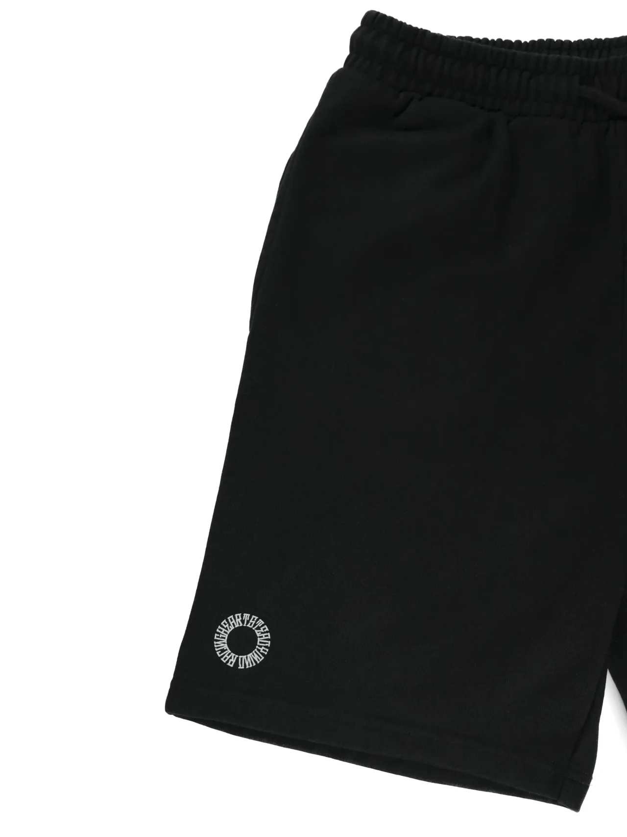 Closeup of the screen-printed RHSM First Edition emblem on the pocket of the black cotton shorts.