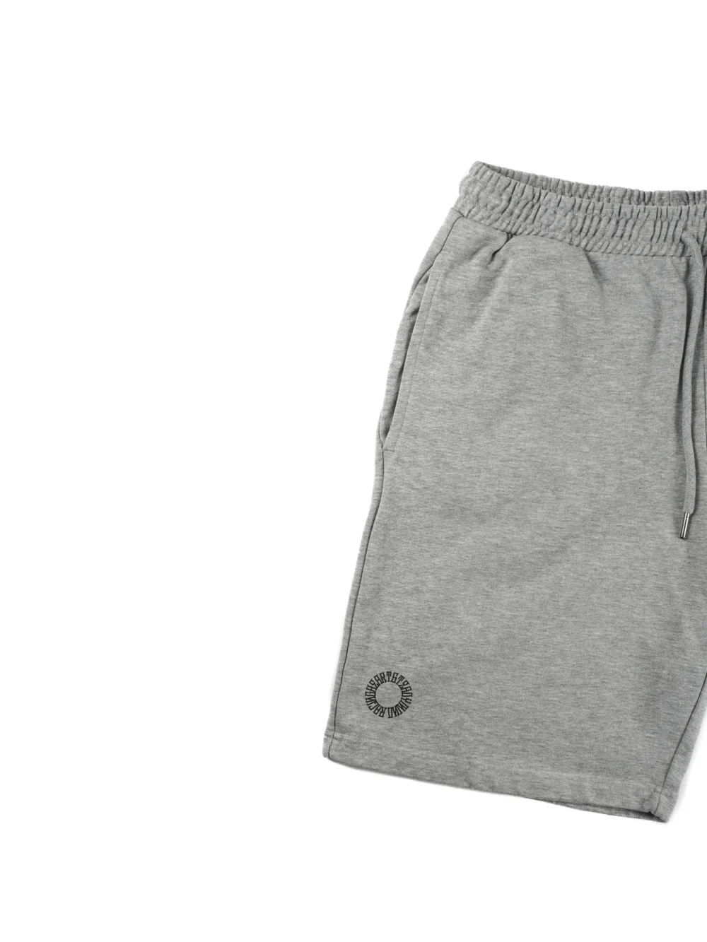 Closeup of the screen-printed RHSM First Edition emblem on the pocket of the gray cotton shorts.