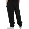 Male model wearing the black RHSM First Edition sweatpants, showing the fit and silhouette from the back.