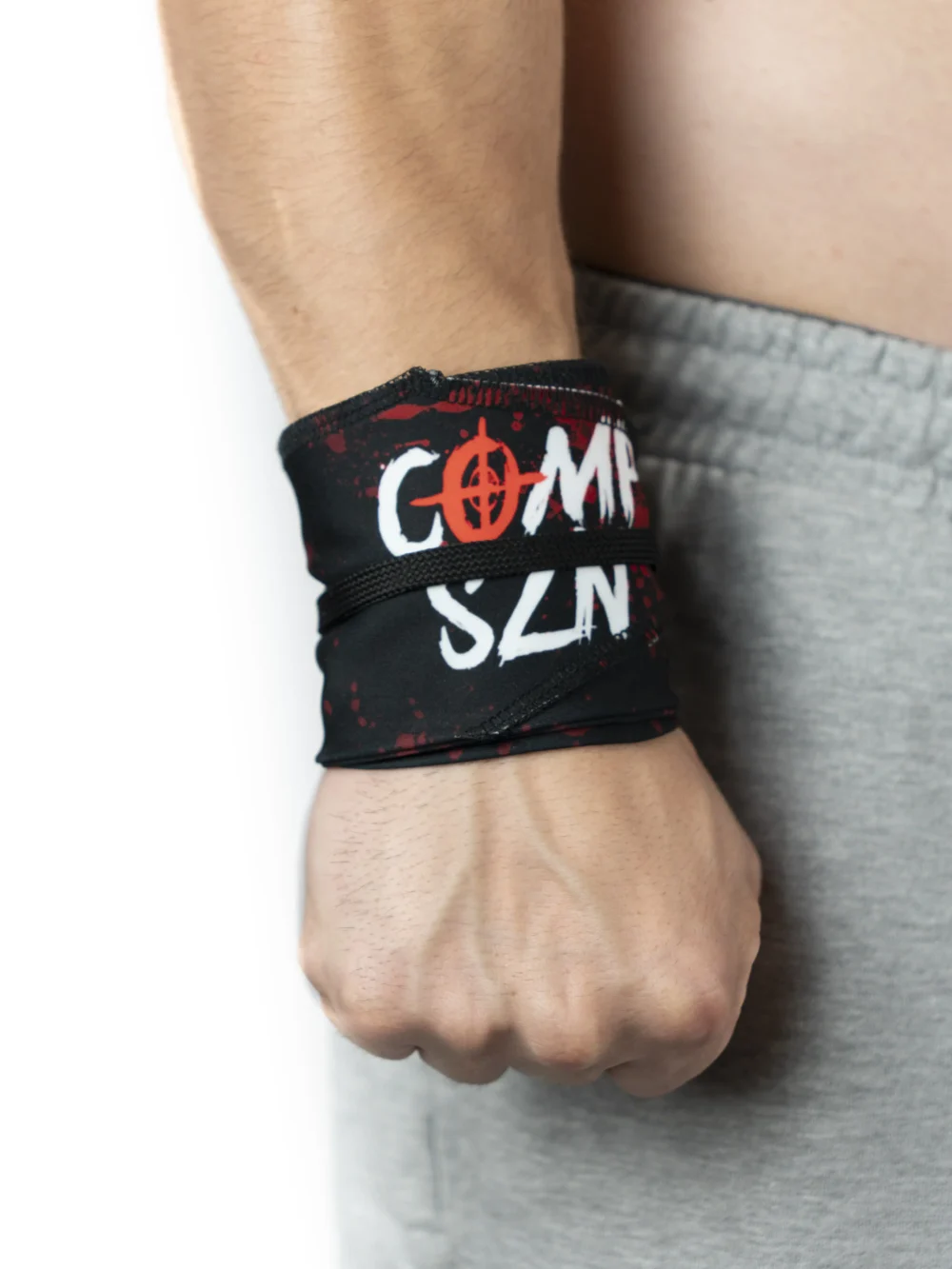 An athlete's wrist secured with the RHSM "Comp Szn" Wrist Wraps V2, ready for competition.