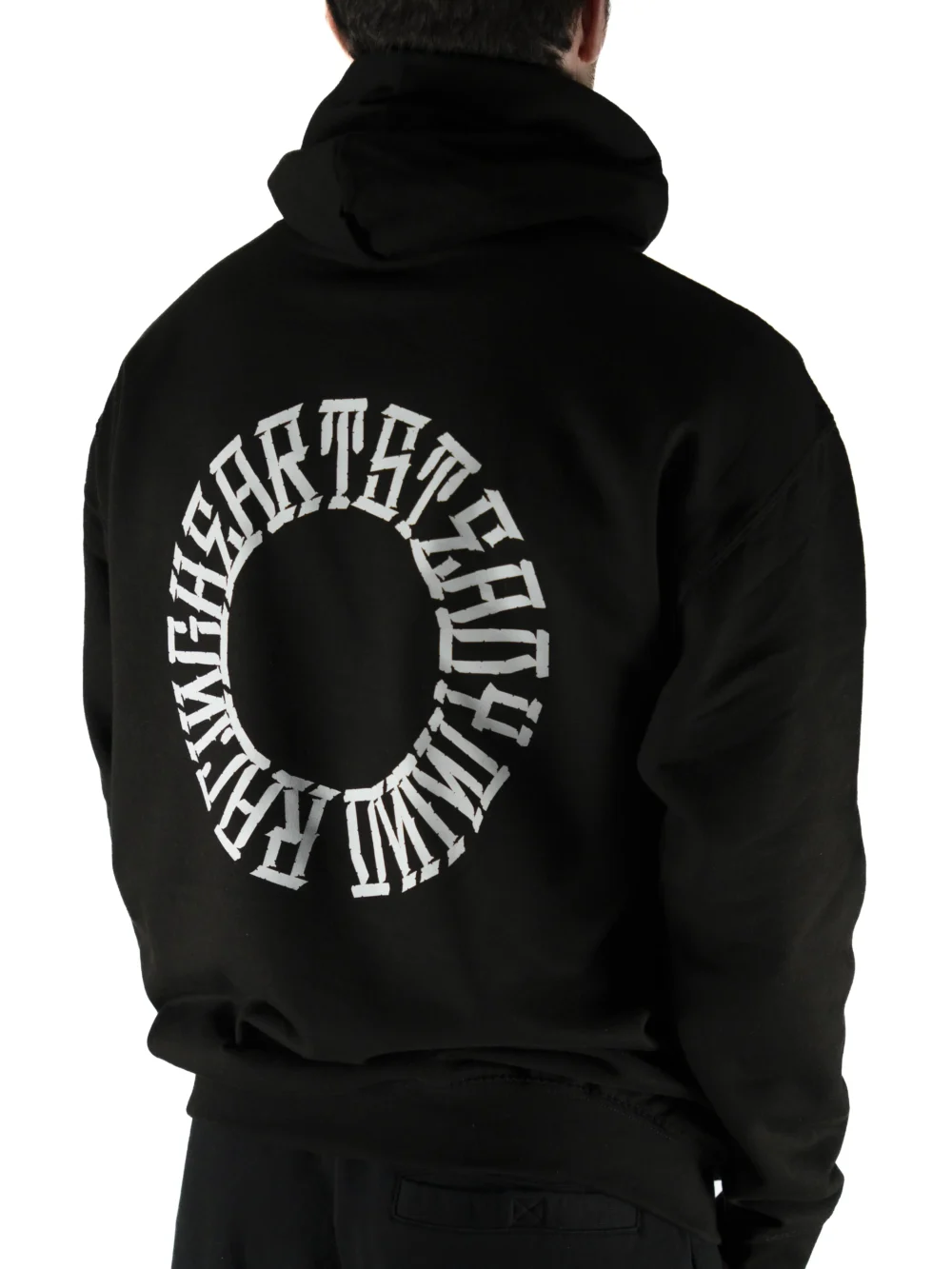 Back view of a model wearing the black RHSM Calisthenics Hoodie V2, with a clear view of the "Racing Heart Steady Mind" back graphic.