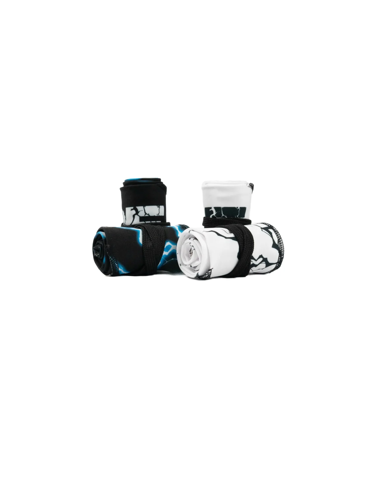 A pair of the white with black lightning and a pair of the black with blue lightning RHSM Godmode Wrist Wraps, rolled up and ready for training.