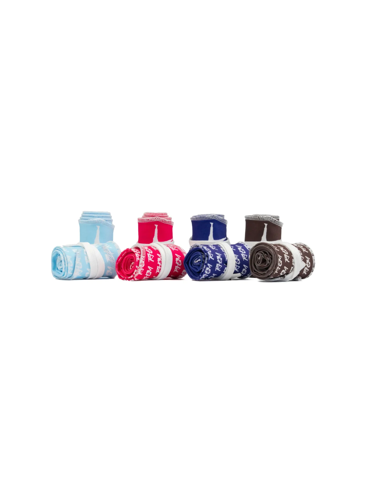 The complete RHSM V2 White Edition collection rolled up, showcasing all colorways including brown, pink, baby blue, and purple.