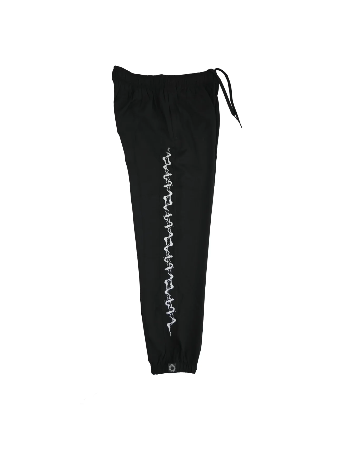 The black GODMODE trackpants laid flat (side view), displaying the iconic lightning graphic that defines this piece of fitness apparel.