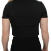 Back view of a female athlete wearing the black Classic Fit Crop Top, highlighting the clean, plain back and the athletic fit across the shoulders.