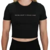 A female athlete wearing the black Classic Fit Crop Top from the front, demonstrating the tailored athletic fit and the minimalist chest graphic.