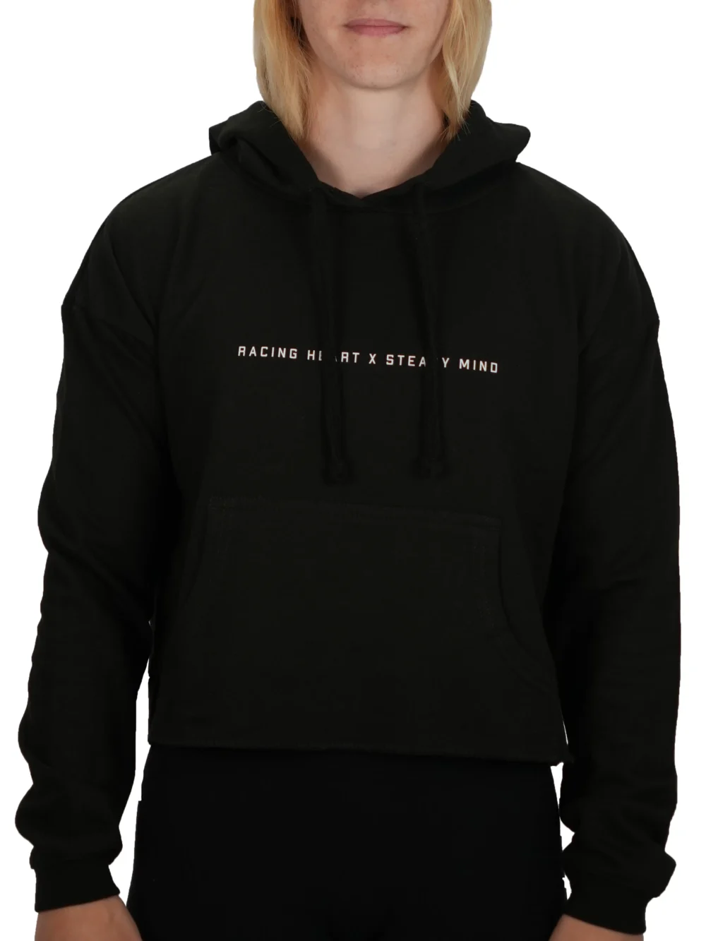 A female model wearing the Classic Fit Cropped Hoodie, showcasing its tailored cropped fit, the minimalist front graphic, and the kangaroo pouch pocket.