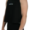 Model wearing the black "GODMODE" cropped tank (front view), demonstrating the flattering fit and raw arm holes of this women's workout gear.