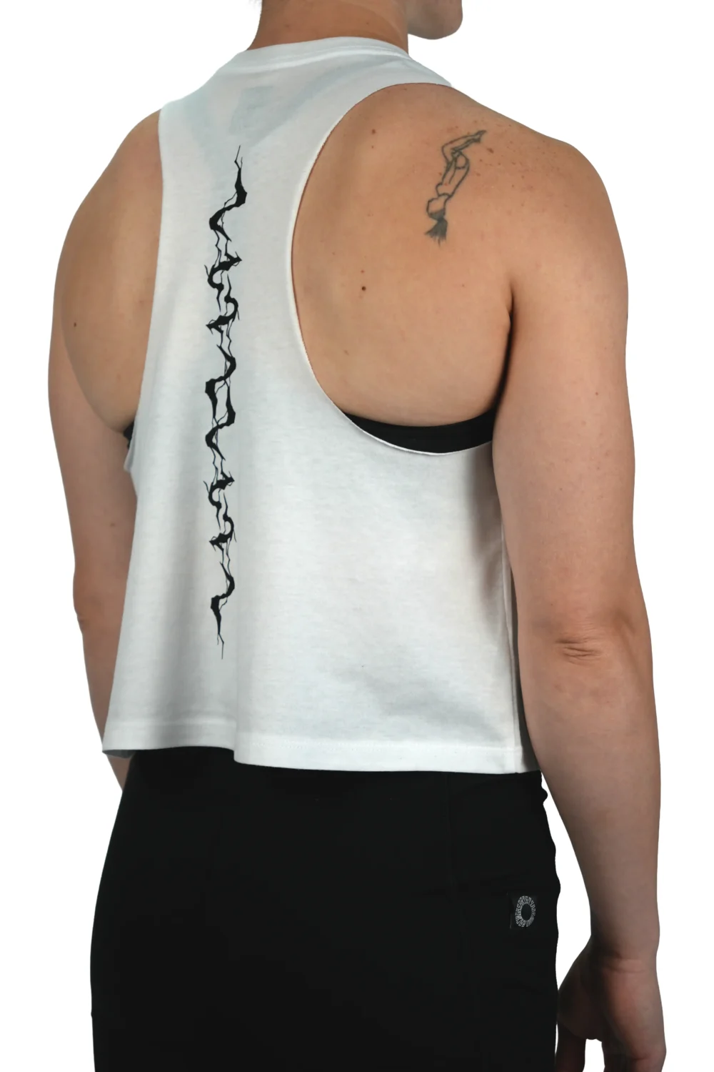 Model wearing the white "GODMODE" cropped tank (back view), showcasing the impactful lightning design and flattering cut from the calisthenics clothing brand RHSM.
