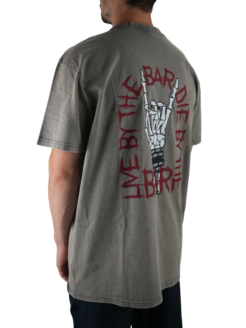 Model wearing the ash "Live By The Bar Die By The Bar" tee (back view), representing the mindset of the calisthenics clothing brand with its powerful back graphic.