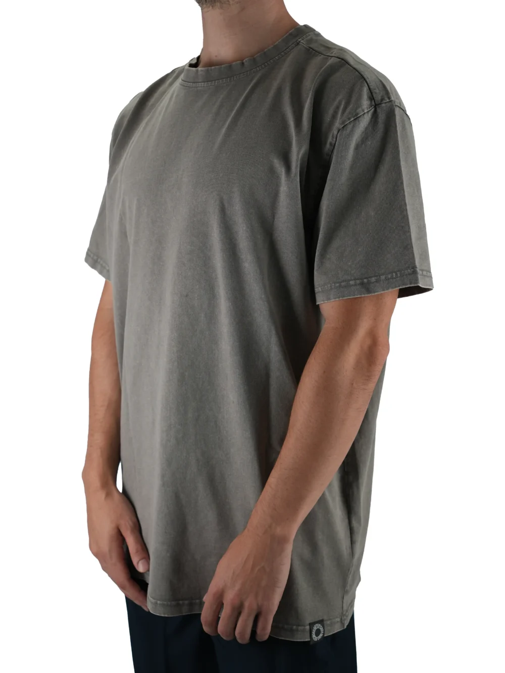 Model wearing the ash oversized acid wash tee (front view), demonstrating the loose fit and dropped shoulders of this workout gear.
