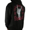 Model wearing the black "Live By The Bar Die By The Bar" hoodie (back view), representing the mindset of the calisthenics clothing brand RHSM.