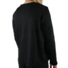 Model wearing the black "[RHXSM]" long sleeve (back view), showcasing the classic silhouette from the calisthenics clothing brand RHSM.