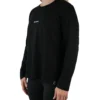Model wearing the black "[RHXSM]" long sleeve tee (front view), demonstrating the comfortable fit of this women's workout gear.