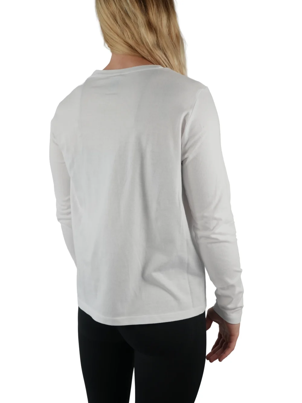Model wearing the white "[RHXSM]" long sleeve (back view), demonstrating the versatile fit and style.