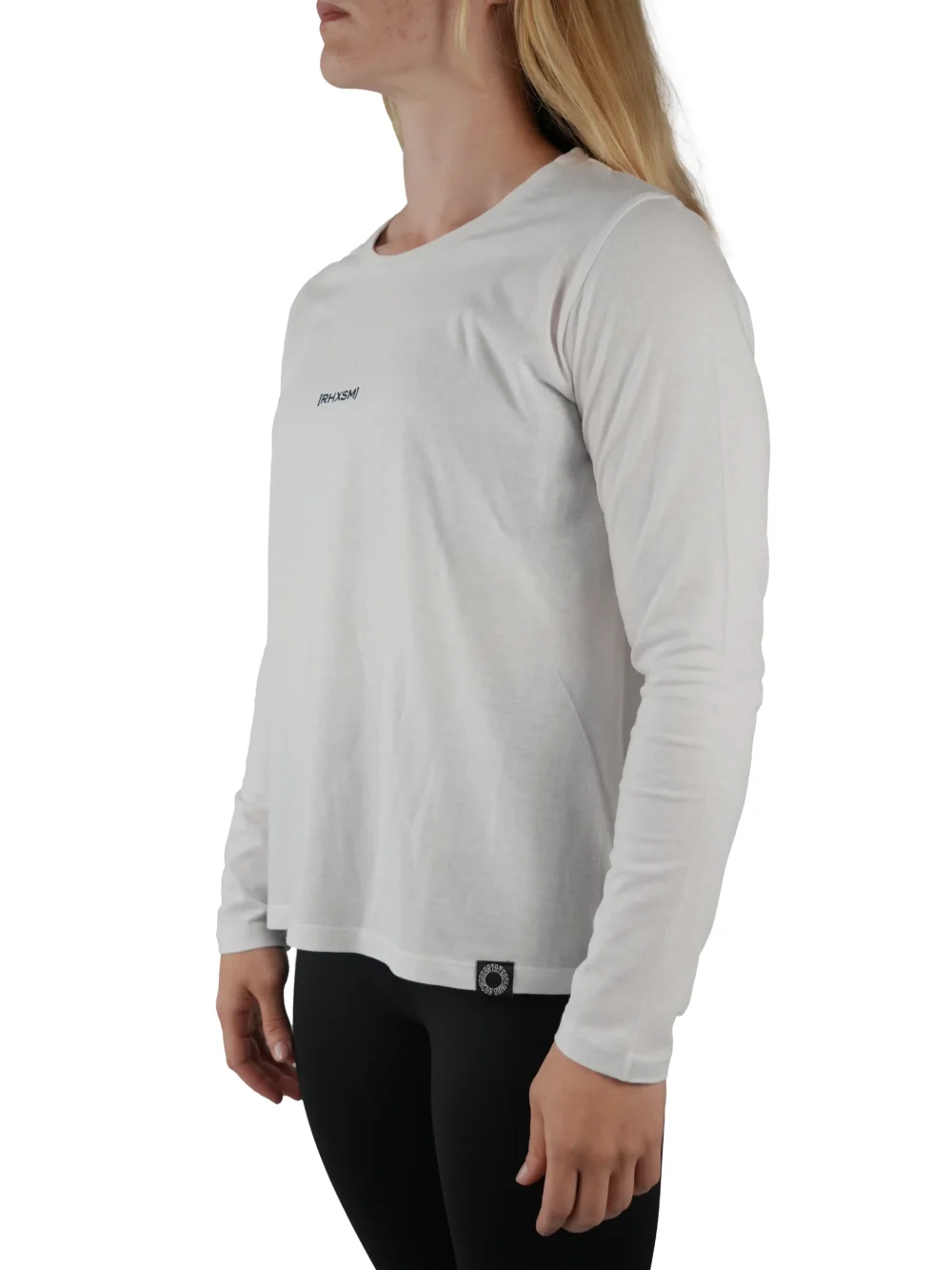 Model wearing the white "[RHXSM]" long sleeve (front view), highlighting the soft ringspun cotton of this essential women's workout gear.
