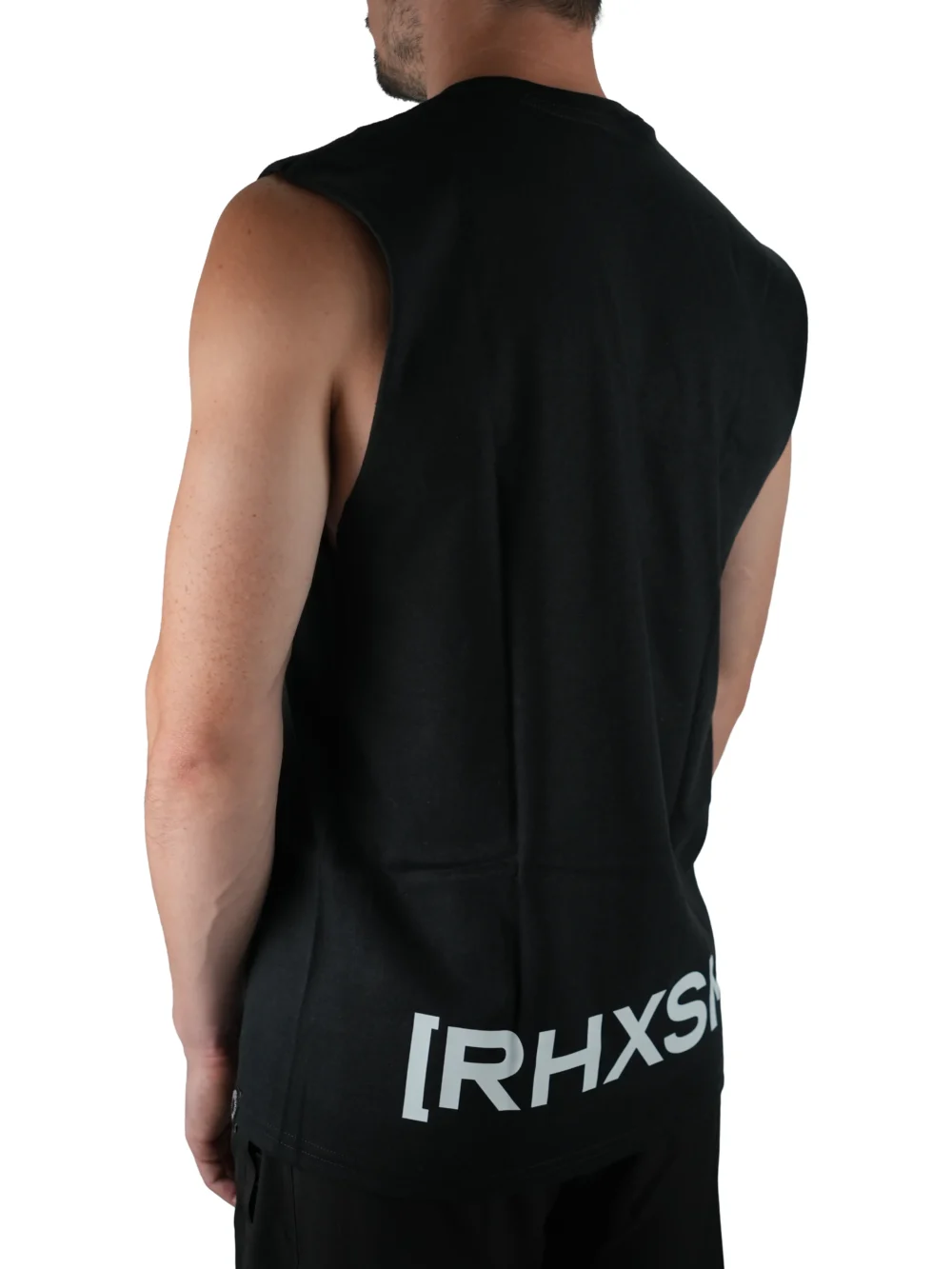 Model wearing the black "[RHXSM]" tank (back view), representing resilience with the powerful back graphic from the calisthenics clothing brand RHSM.