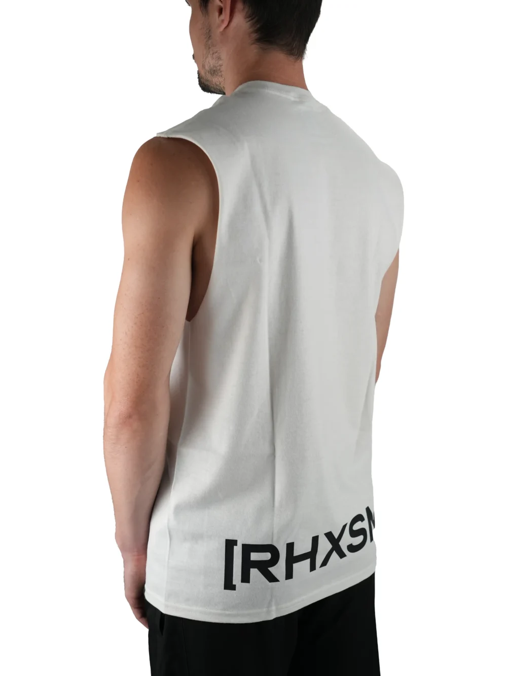 Model wearing the white "[RHXSM]" tank (back view), showcasing the impactful back design from the calisthenics clothing brand RHSM.