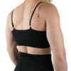 Model wearing the black "[RHXSM]" sports bra (back view), showcasing the adjustable straps and ribbed back design from the calisthenics clothing brand RHSM.