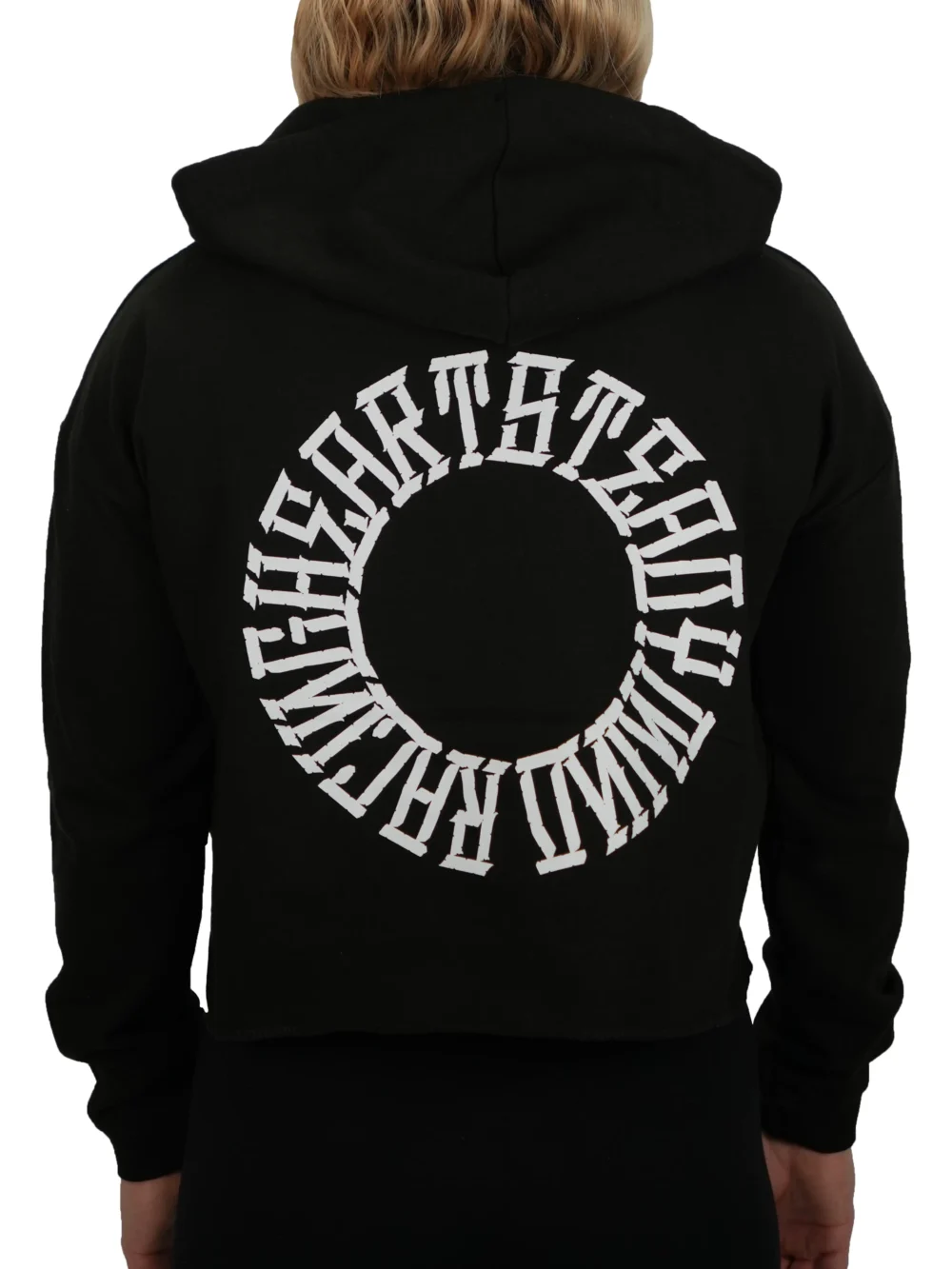 Model showing the back of the black cropped hoodie, highlighting the "Racing Heart Steady Mind" graphic on the premium RHSM workout gear.