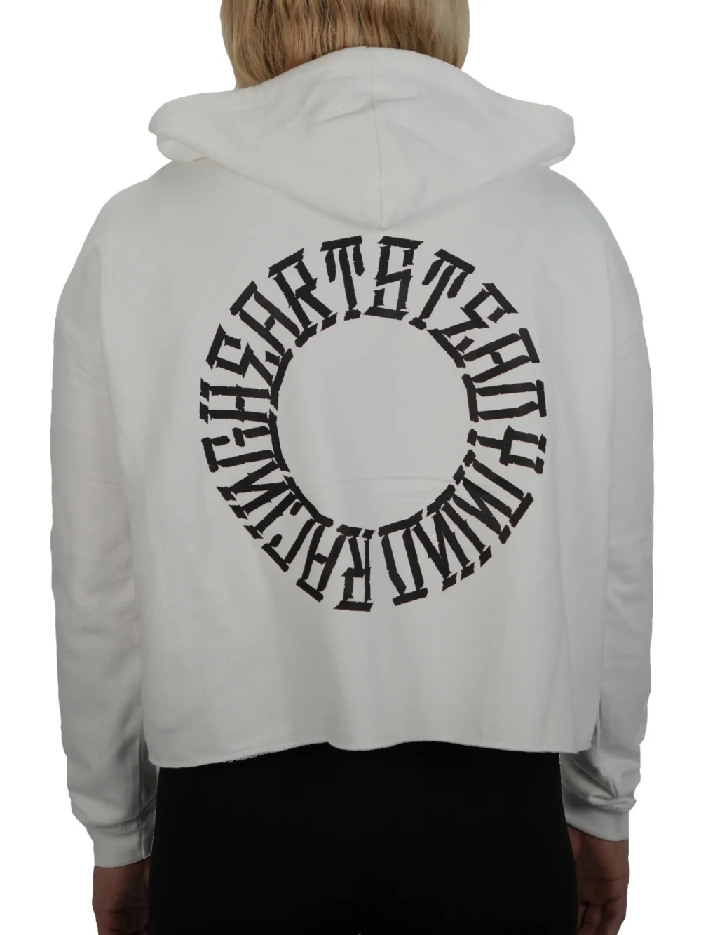 Model wearing the back of the white cropped hoodie, detailing the statement "Racing Heart Steady Mind" graphic from the RHSM calisthenics clothing brand.