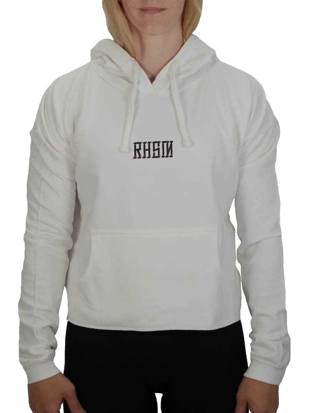 Model wearing the white RHSM 1st Edition cropped hoodie, demonstrating the modern athletic cut of the women's fitness apparel.
