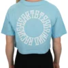 Model showing the back of the baby blue oversized tee and "Racing Heart Steady Mind" graphic, representing the RHSM calisthenics clothing brand.