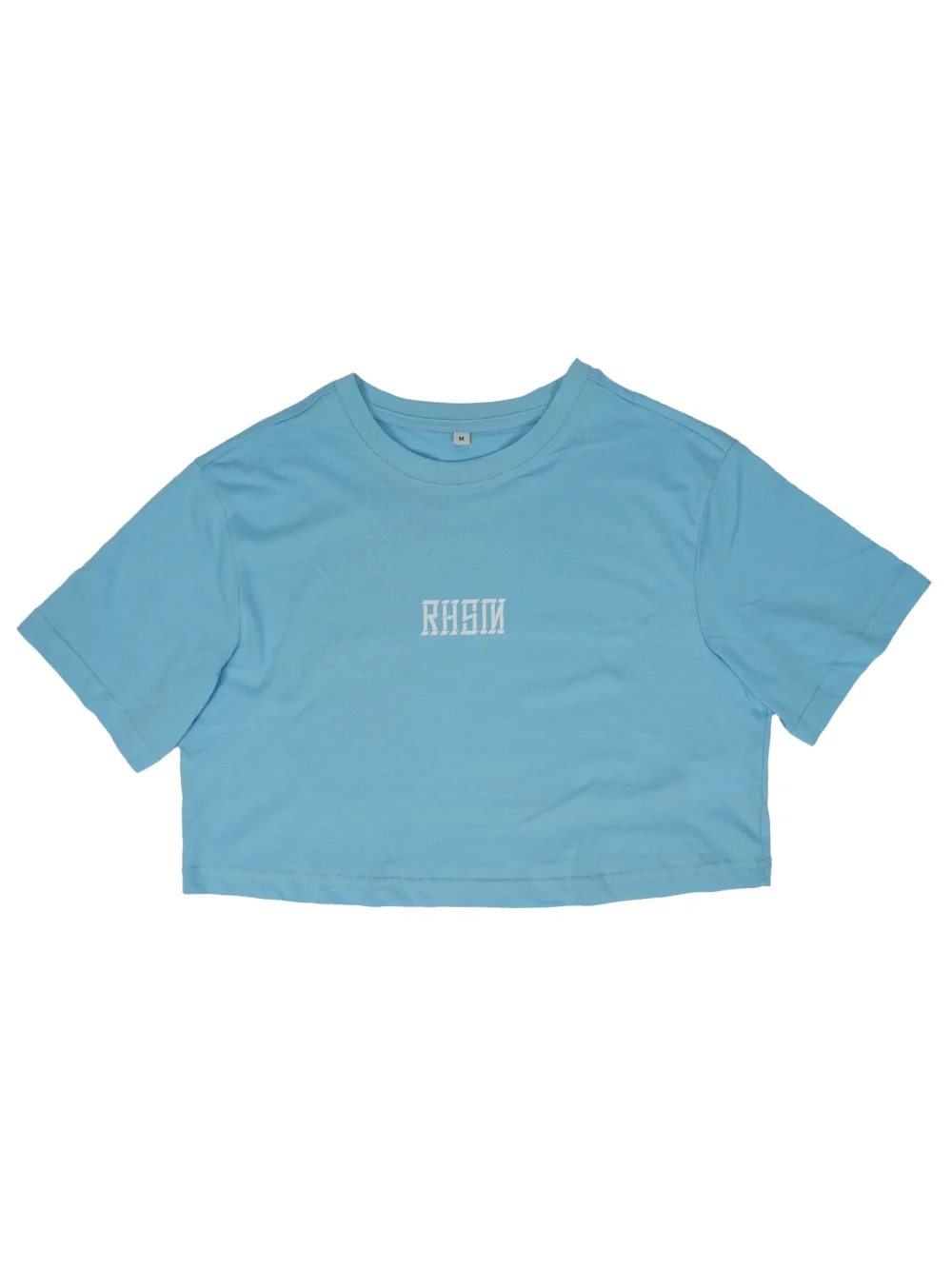 RHSM 1st Edition Women's Oversized Tee in baby blue laid flat, highlighting the soft 100% cotton material of the fitness apparel.