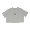 RHSM 1st Edition Women's Oversized Tee in white laid flat, showing the minimal front detail of the premium calisthenics apparel.