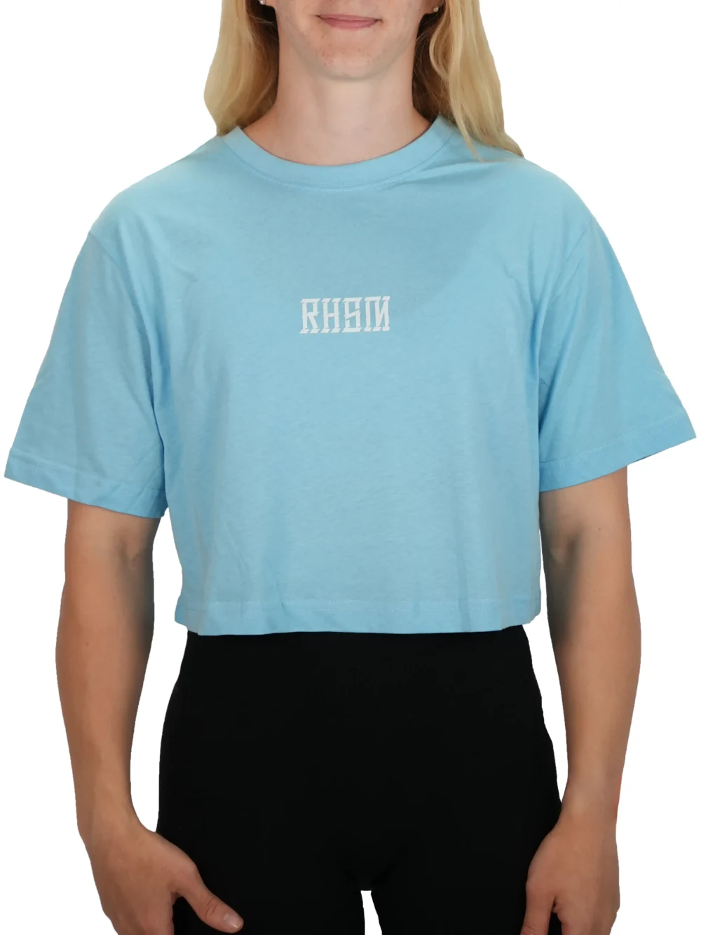 Model wearing the baby blue RHSM 1st Edition oversized tee, showing the fit and drape of the women's calisthenics apparel.